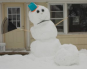 The guys behind us built a cool snowman.  He was really tall to have rakes for arms.