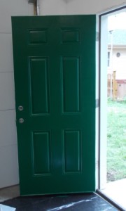 Rick finished painting the side entry door.  Now I need the other three on the house painted the same color.