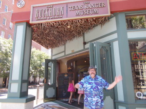 Rich outside of the Buckhorn Saloon with the antlers over the entrance.