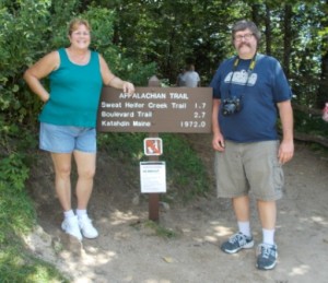 Standing at Appalachian Trail with sign to Maine.  We'd go, but we have to back by dinner time.