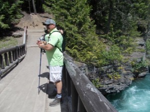 Alex on the bridge over McDonald River.