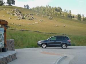 Our subie in front of some really old rocks.