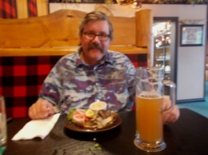 Rich in heaven with his beer and smoked trout.