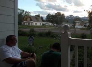 Sitting on the porch watching sunset on the mountains.
