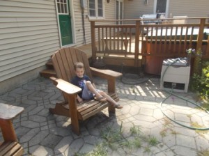 Cael hanging out on the patio after he went for his turn in Sally.
