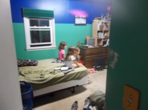 Not a good photo, but just had to show the kids in Rick's room interrogating him.