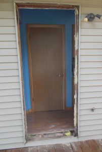 The old door is out.  Ready to prep for the new one.