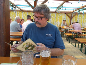 Rich deciding on lunch with his beer