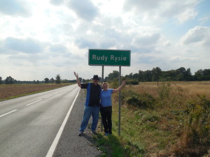 Rich and Joy with Rudy Rysie sign.