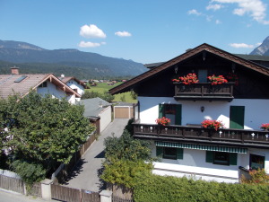 View from our balcony looking out to the village pasture behind the houses.