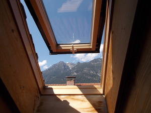 Toilet with a view through the skylight. We are in the rafters here.